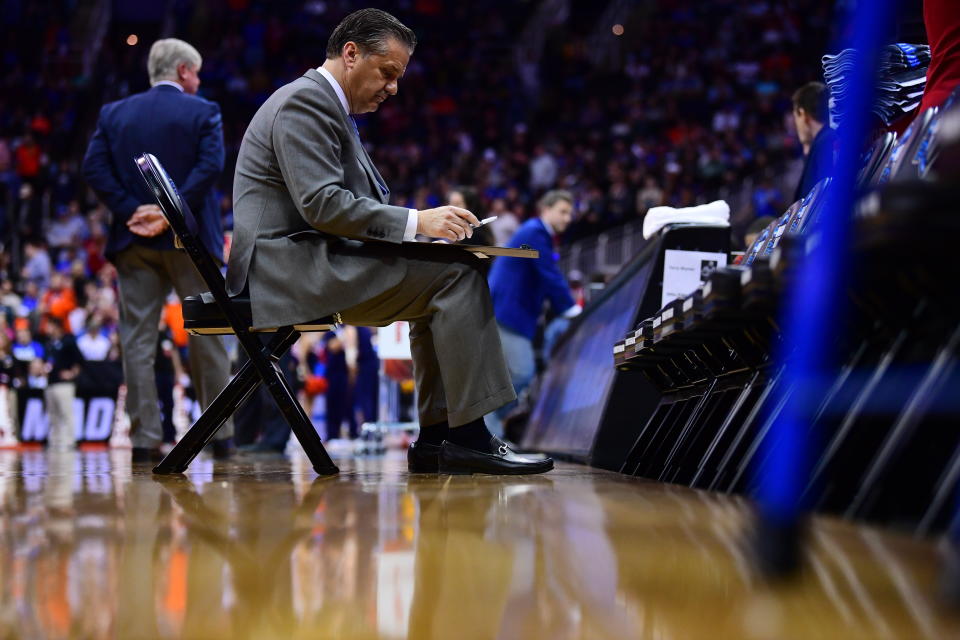 KANSAS CITY, MO - MARCH 31: Head Coach John Calipari of the The Kentucky Wildcats writes down plays while taking on the Auburn Tigers in the Elite Eight round of the 2019 NCAA Men's Basketball Tournament held at Sprint Center on March 31, 2019 in Kansas City, Missouri. (Photo by Ben Solomon/NCAA Photos via Getty Images)