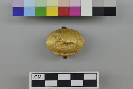 A signet ring found inside an ancient tomb dated circa 1500 B.C in the southeastern city of Pylos, Greece, is seen in this handout picture provided by the Greek Culture Ministry, October 26, 2015. REUTERS/Greek Culture Ministry/Handout via Reuters