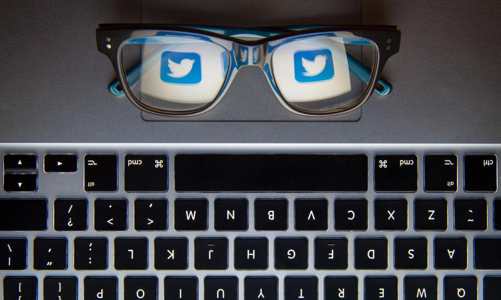 The Twitter bird logo reflected in a pair of glasses