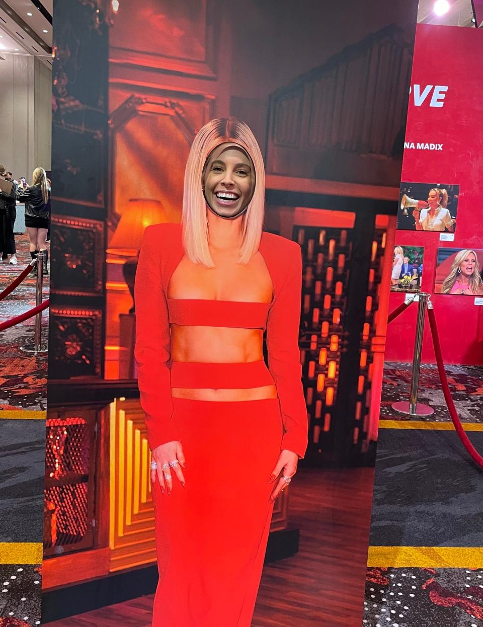 A cut-out of Ariana Madix wearing her Season 10 red cut-out revenge dress