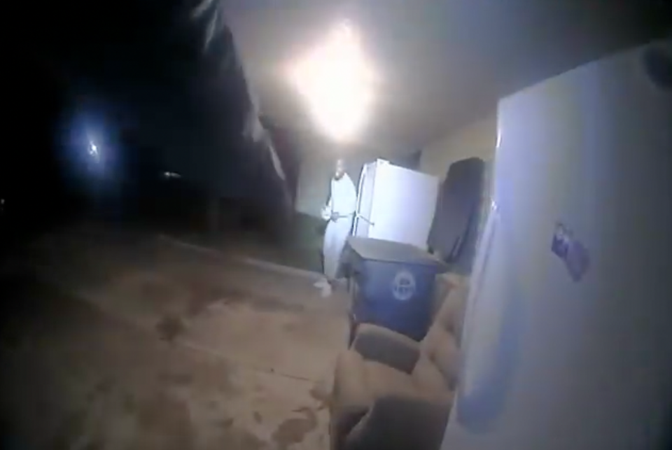 In body camera footage released by the Lawton Police Department, Quadry Sanders stands as he is confronted with police outside a Lawton home on Dec. 5, 2021. Former Lawton police officers Robert Hinkle and Nathan Ronan have been charged with first-degree manslaughter after Sanders was shot during the confrontation.