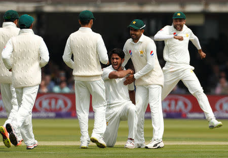 Cricket - England vs Pakistan - First Test - Lord's Cricket Ground, London, Britain - May 24, 2018 Pakistan's Hasan Ali celebrates taking the wicket of England's Joe Root Action Images via Reuters/John Sibley