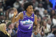 Utah Jazz guard Collin Sexton (2) runs up court after scoring 3-pointer against the Minnesota Timberwolves during the first half of an NBA basketball game Wednesday, Feb. 8, 2023, in Salt Lake City. (AP Photo/Rick Bowmer)