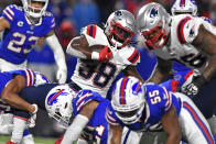 New England Patriots running back Rhamondre Stevenson (38) carries the ball during the second half of an NFL football game against the Buffalo Bills in Orchard Park, N.Y., Monday, Dec. 6, 2021. (AP Photo/Adrian Kraus)