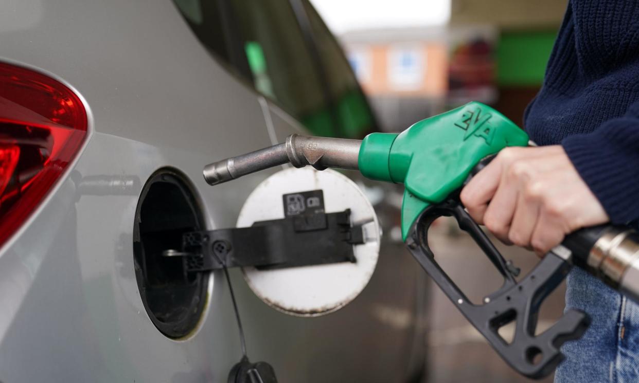 <span>Petrol prices have fallen in response to concerns that the global economy is slowing down and demand from big consumers such as China will be weaker.</span><span>Photograph: Joe Giddens/PA</span>