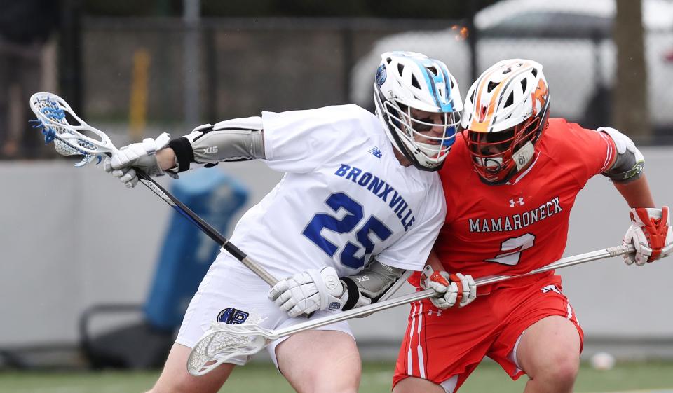 Mamaroneck defeated Tommy Garofalo (25) and Bronxville 14-8 in boys lacrosse action at Bronxville High School April 21, 2022.