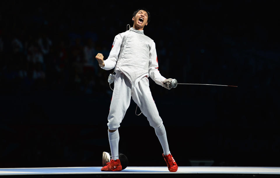 LONDON, ENGLAND - JULY 31: Sheng Lei of China celebrates winning the Men's Foil Individual Gold Medal Bout against Alaaeldin Abouelkassem of Egypt on Day 4 of the London 2012 Olympic Games at ExCeL on July 31, 2012 in London, England. (Photo by Lars Baron/Getty Images)