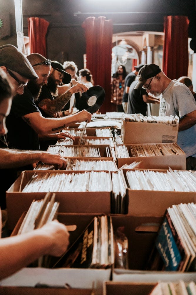 Record fair shopping at HOCO Fest in Tucson, Arizona.