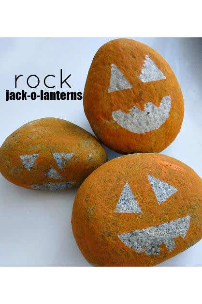 <p>What's more fun: Picking out the rock or painting it?</p><p><strong>Get the tutorial at <a href="https://www.notimeforflashcards.com/2010/10/rock-jack-o-lanterns.html" rel="nofollow noopener" target="_blank" data-ylk="slk:No Time For Flashcards;elm:context_link;itc:0;sec:content-canvas" class="link ">No Time For Flashcards</a>.</strong></p>