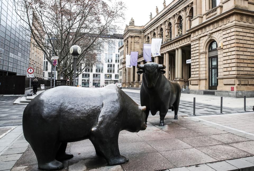 The bull sculpture depicting the rise of the market (R) and the bear sculpture depicting its fall in Frankfurt am Main, west Germany, on December 28, 2020. (Photo by ARMANDO BABANI/AFP via Getty Images)