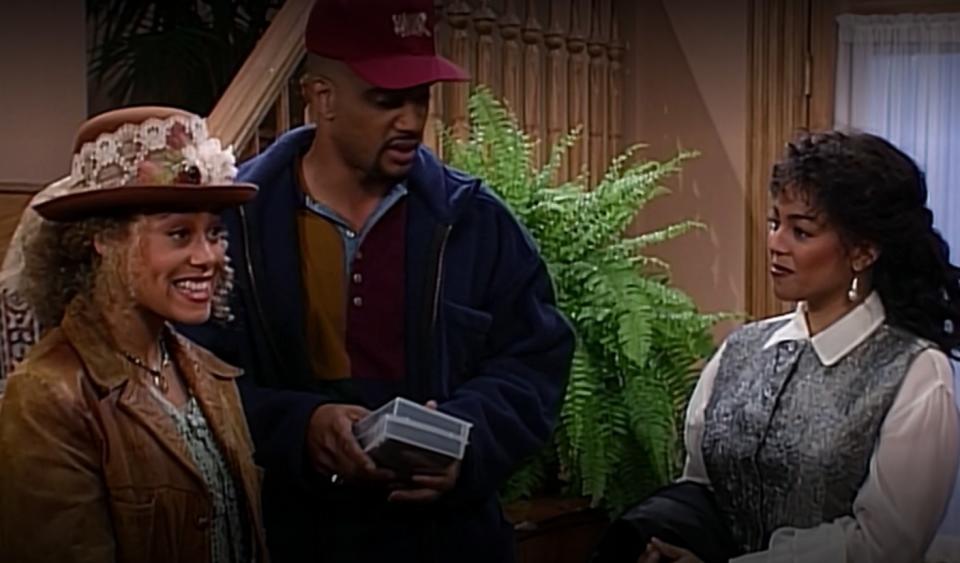 Cree Summers with John Henton and Kim Fields in a scene from "Living Single"