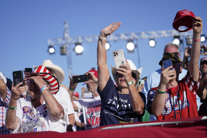 Supporters of former President Donald Trump cheer as he speaks at a campaign rally at Waco Regional Airport, Saturday, March 25, 2023, in Waco, Texas. (AP Photo/Evan Vucci)