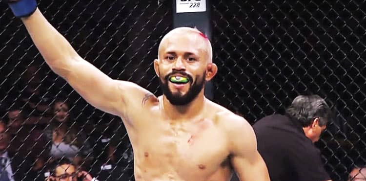 Deiveson Figueiredo UFC post-fight arm raised