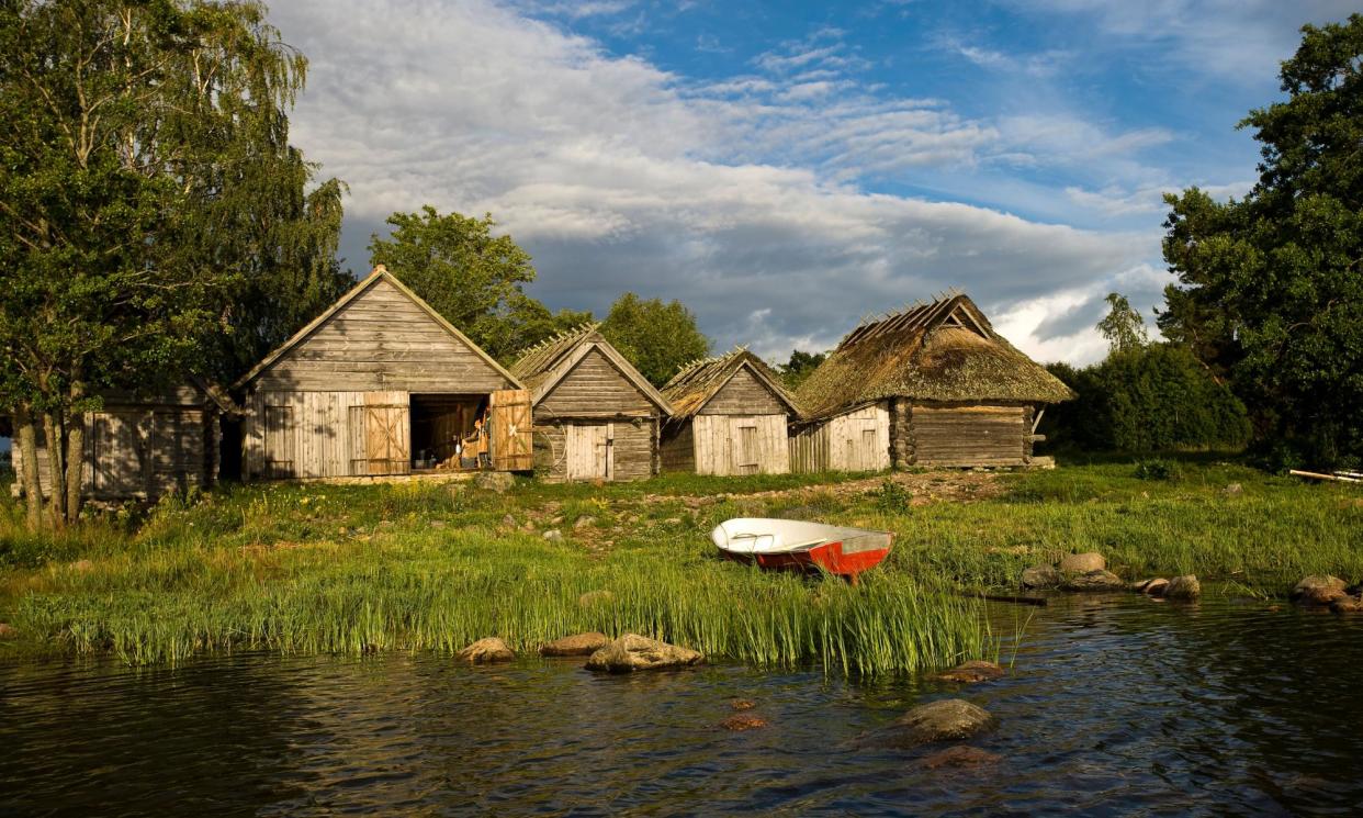 <span>Summer cabins in the fishing village of Altja at the eastern end of Lahemaa national park.</span><span>Photograph: Alamy</span>