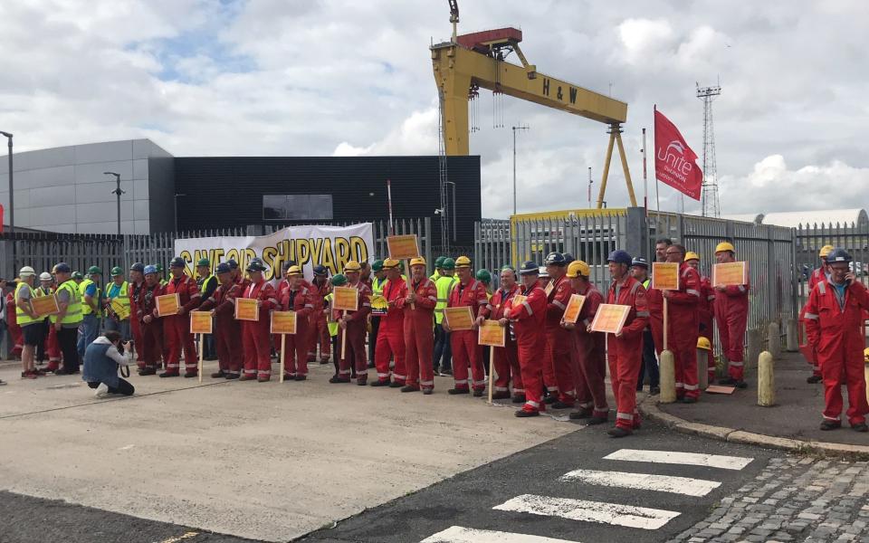 Workers demonstrate against the threat of closure at the Harland and Wolff shipyard before its last-gasp rescue in 2019 - Rebecca Black/PA