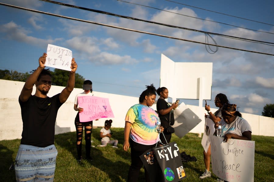 Friends, family and activists gather Friday, Aug. 25, 2023, in Columbus, Ohio, to protest the shooting of 21-year-old Ta’Kiya Young, who was shot and killed a day earlier by Blendon Township police outside an Ohio supermarket. Young was pregnant and due to give birth in November, according to her family. (Courtney Hergesheimer/The Columbus Dispatch via AP)