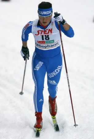 Russia's Evgenia Shapovalova competes in the qualification round of the women's 1.2 km classic sprint World Cup cross country event at Ruka ski resort near the town of Kuusamo November 28, 2009. REUTERS/Bob Strong