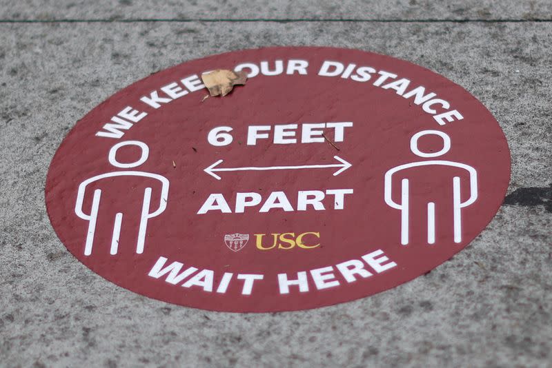 A social distancing marker is seen on an empty University of Southern California (USC) campus, amid the outbreak of the coronavirus disease (COVID-19), in Los Angeles