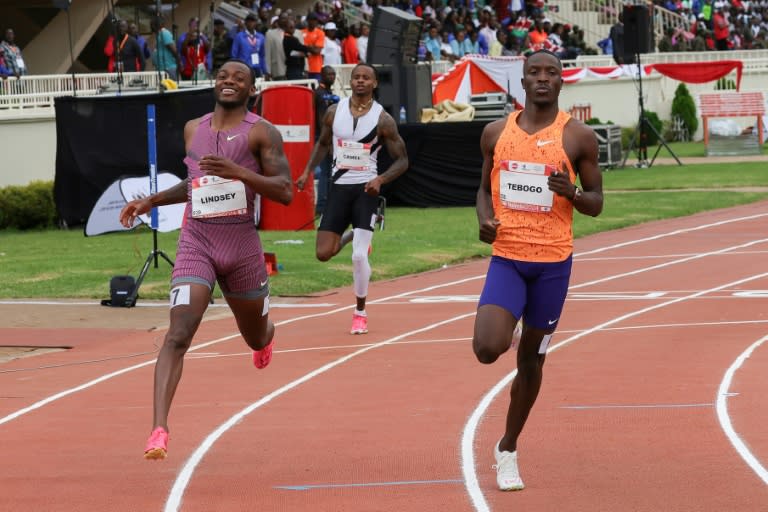 Courtney Lindsey (left) and Letsile Tebogo cross the line in an identical time in the men's 200m in Nairobi (Tony Karumba)