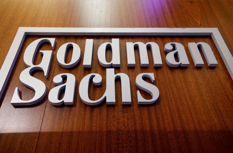 FILE PHOTO: The Goldman Sachs company logo is on the floor of the NYSE in New York