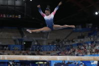 Simone Biles, of the United States, performs on the balance beam during the artistic gymnastics women's apparatus final at the 2020 Summer Olympics, Tuesday, Aug. 3, 2021, in Tokyo, Japan. (AP Photo/Ashley Landis)