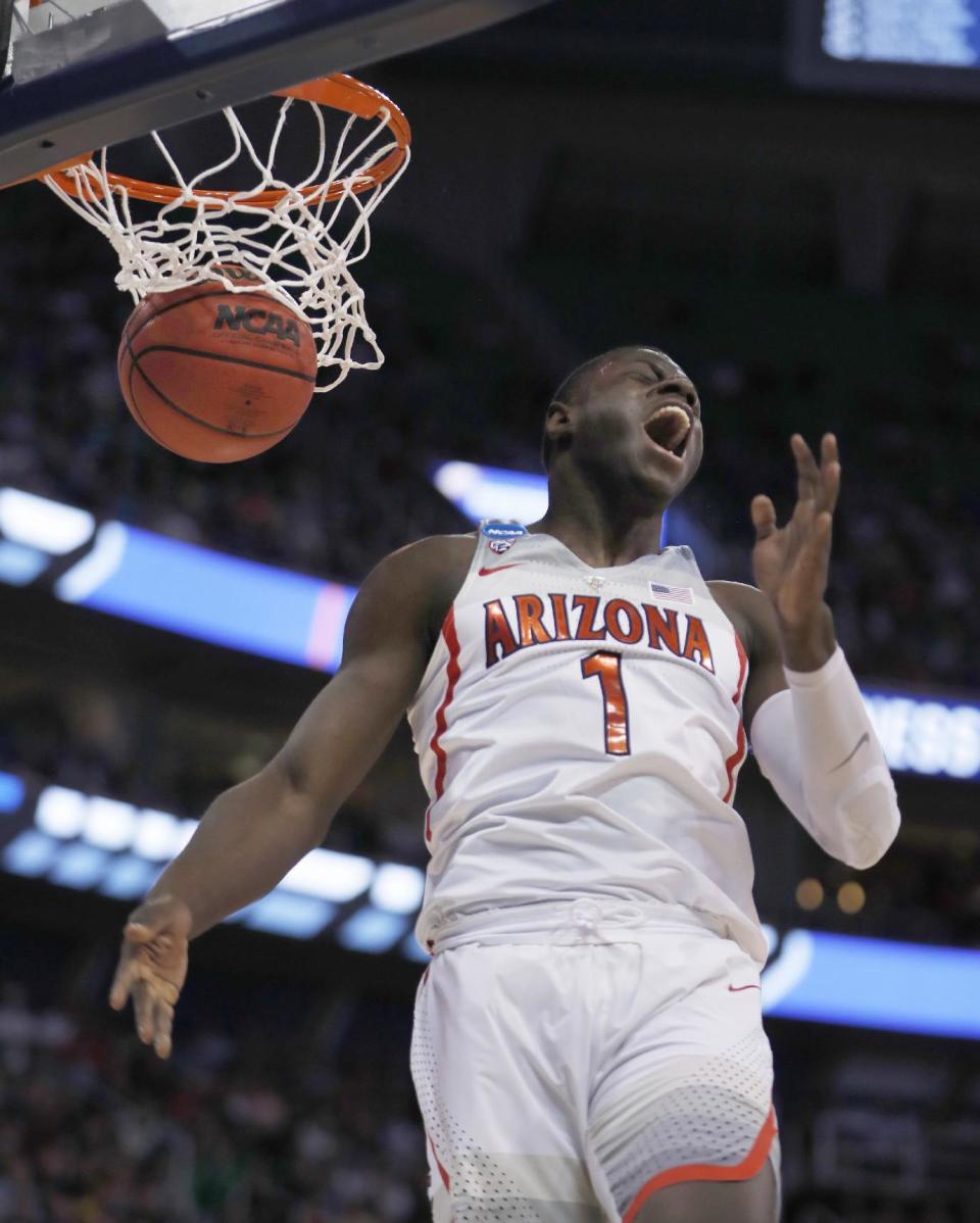 Arizona guard Rawle Alkins shouts after his dunk during the first half against North Dakota in an NCAA men's college basketball tournament first-round game Thursday, March 16, 2017, in Salt Lake City. (AP Photo/George Frey)