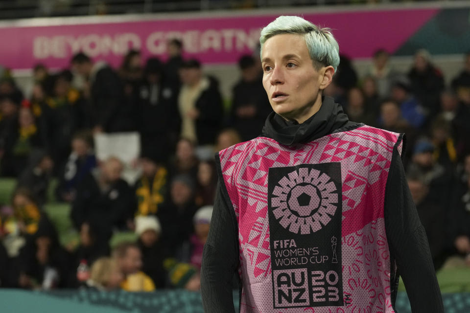 United States' Megan Rapinoe warms up on the sideline during the Women's World Cup round of 16 soccer match between Sweden and the United States in Melbourne, Australia, Sunday, Aug. 6, 2023. (AP Photo/Scott Barbour)