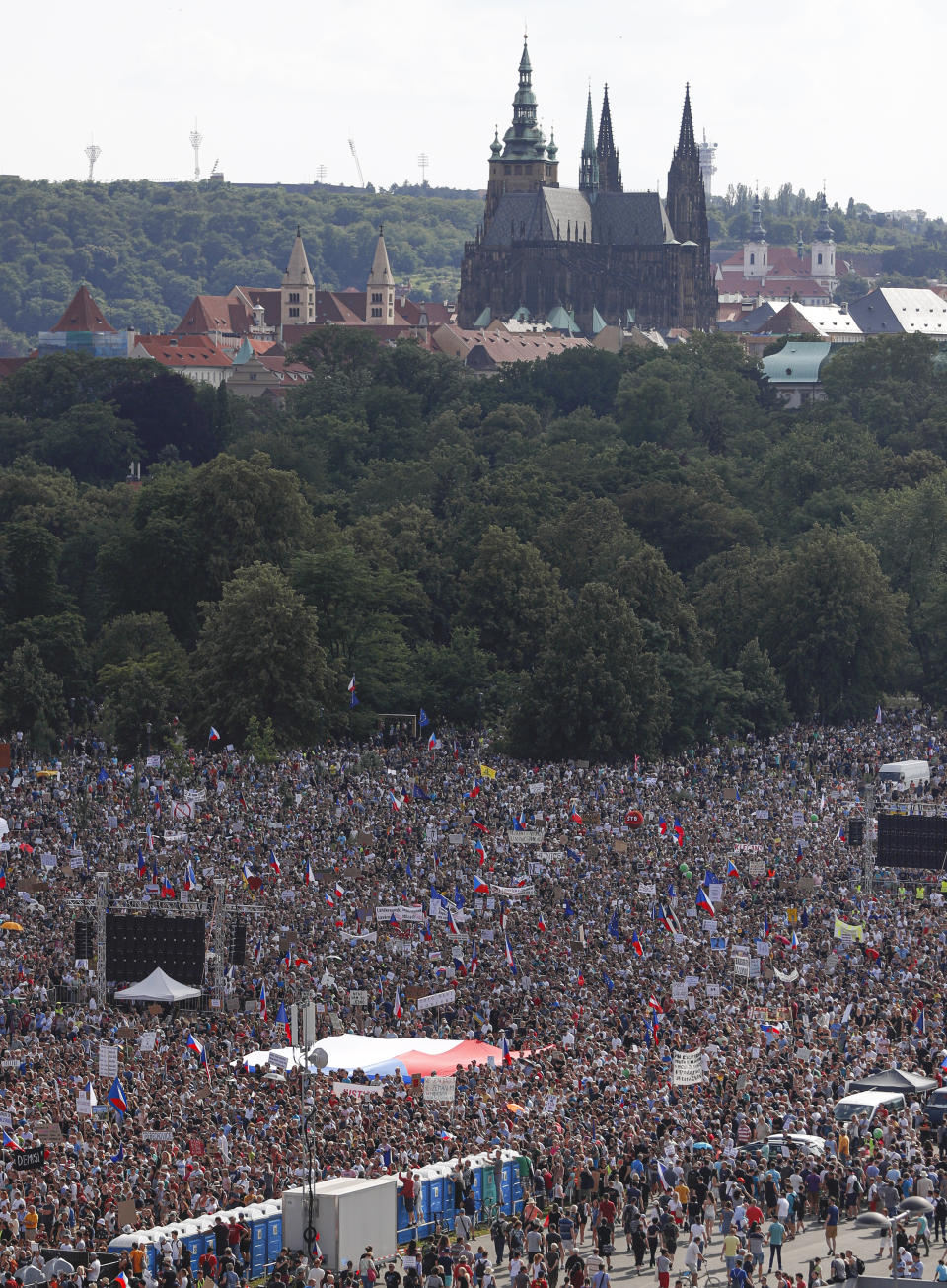 People join a protest demanding the resignation of the Czech Prime Minister Andrej Babis in Prague, Czech Republic, Sunday, June 23, 2019. Protesters are calling on Czech Prime Minister Andrej Babis to step down over fraud allegations and subsidies paid to his former companies. (AP Photo/Petr David Josek)