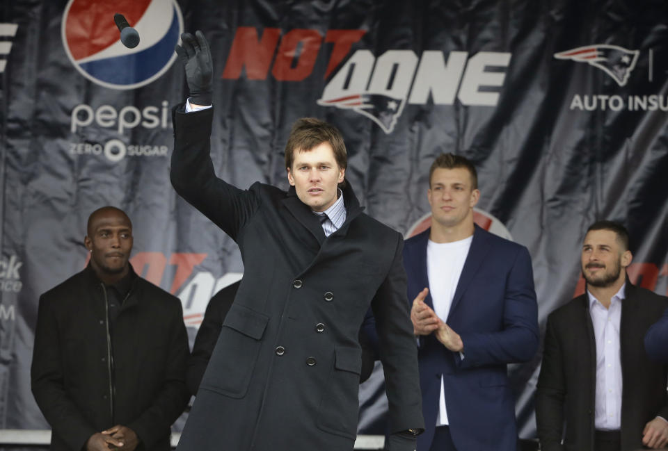 Tom Brady, addressing a crowd at the Patriots' Super Bowl send-off rally on Monday, took issue with criticism of his daughter. (AP) 