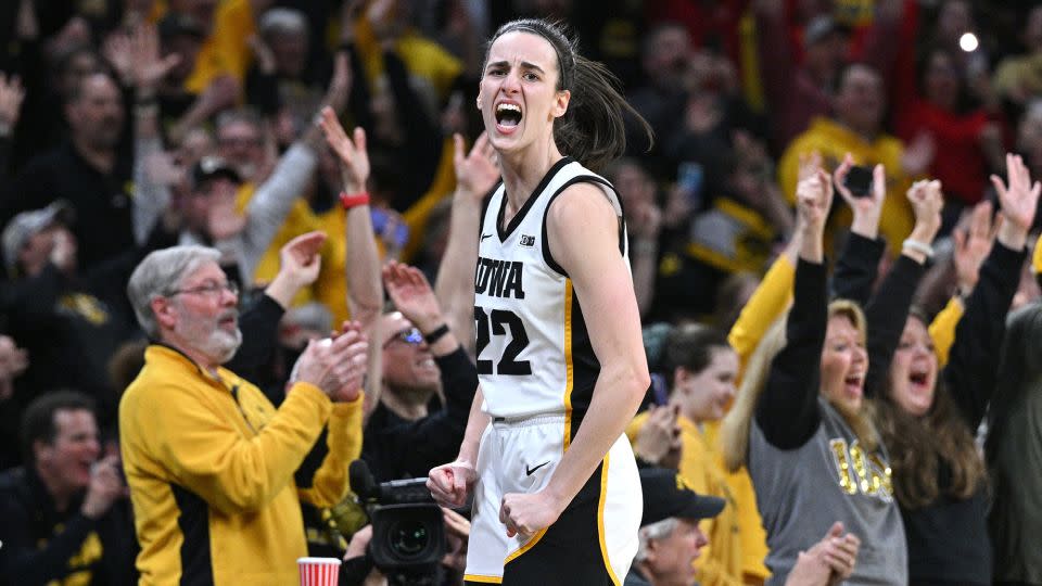 Clark celebrates after becoming women's college basketball's leading scorer. - Jeffrey Becker/USA TODAY Sports/Reuters