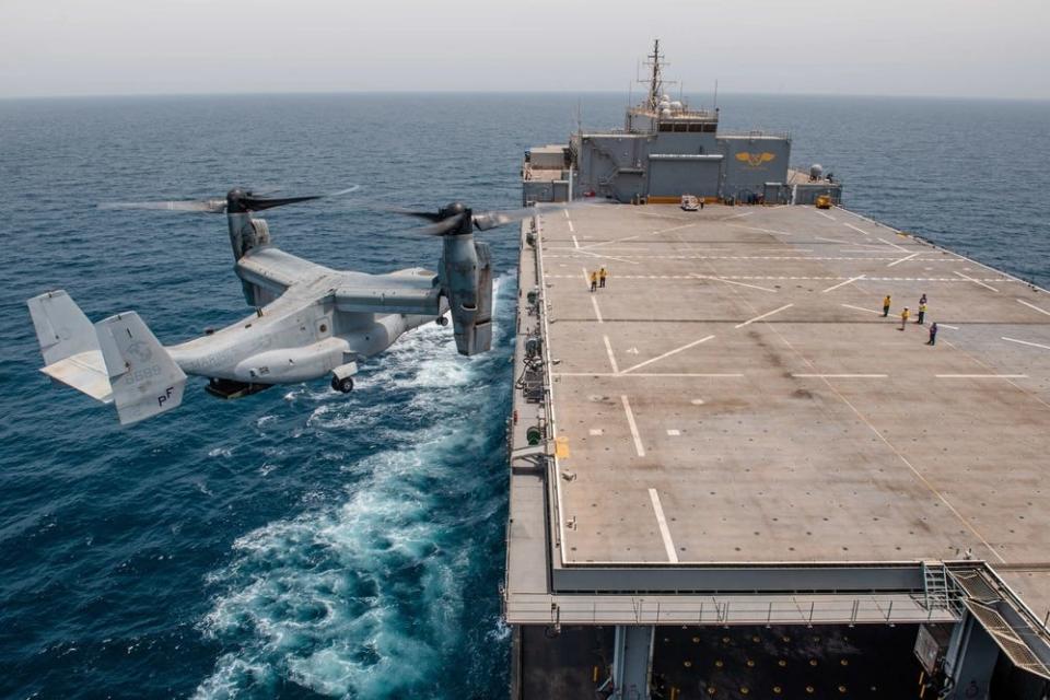 An MV22 Osprey helicopter prepares to land aboard expeditionary sea base USS Lewis B. Puller.