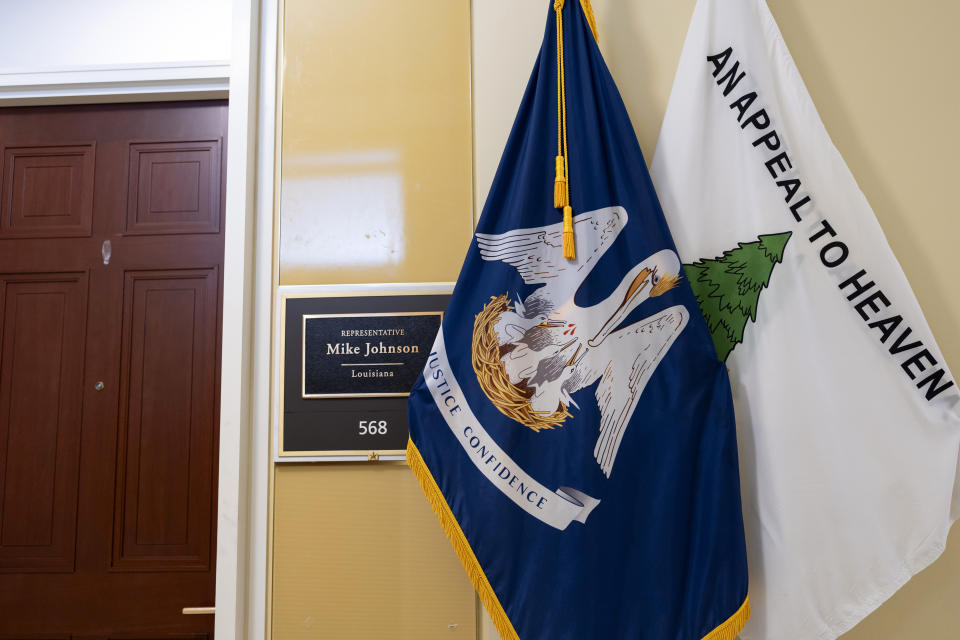 The Appeal to Heaven flag stands with the Louisiana state flag outside the district office of Speaker of the House Mike Johnson, R-La., in the Cannon House Office Building, at the Capitol in Washington, Thursday, May 23, 2024. Supreme Court Justice Samuel Alito is embroiled in a second flag controversy, this time over the “Appeal to Heaven” flag, a banner that in recent years has come to symbolize Christian nationalism and the false claim that the 2020 presidential election was stolen. The flag was seen outside his New Jersey beach home last summer. (AP Photo/J. Scott Applewhite)