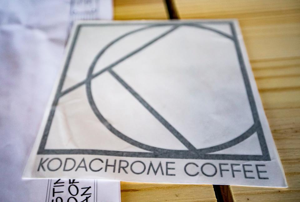 A decal sits on a table inside Zen Cafe, which is rebranding as Kodacrome Coffee, on Friday, Nov. 19, 2021, in South Bend. 