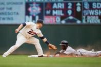 May 23, 2018; Minneapolis, MN, USA; Detroit Tigers third baseman Niko Goodrum (28) slides safely into second base in the ninth inning against Minnesota Twins second baseman Brian Dozier (2) at Target Field. Mandatory Credit: Brad Rempel-USA TODAY Sports