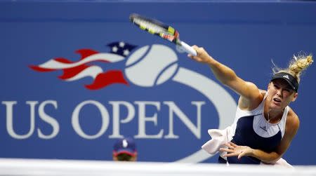 Sep 3, 2015; New York, NY, USA; Caroline Wozniacki of Denmark serves against Petra Cetkovska of the Czech Republic (not pictured) on day four of the 2015 U.S. Open tennis tournament at USTA Billie Jean King National Tennis Center. Mandatory Credit: Geoff Burke-USA TODAY Sports