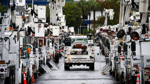 PHOTO: Duke Energy trucks are staged in the parking lot at Tropicana Field in preparation for Hurricane Ian, Sept. 28, 2022 in St. Petersburg, Fla. (Dirk Shadd/Tampa Bay Times via AP)