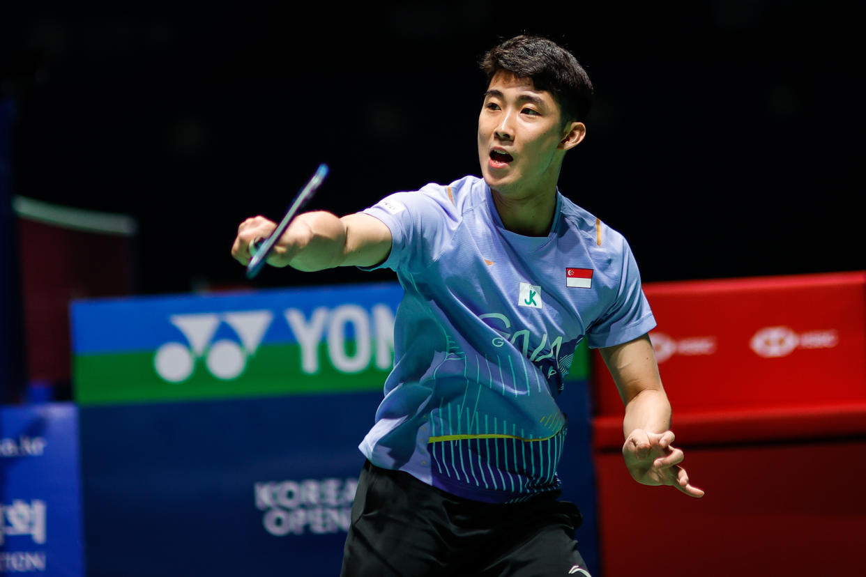 Singapore shuttler Loh Kean Yew returns a shot against Japan's Kodai Naraoka at the 2023 Korea Open in Yeosu.