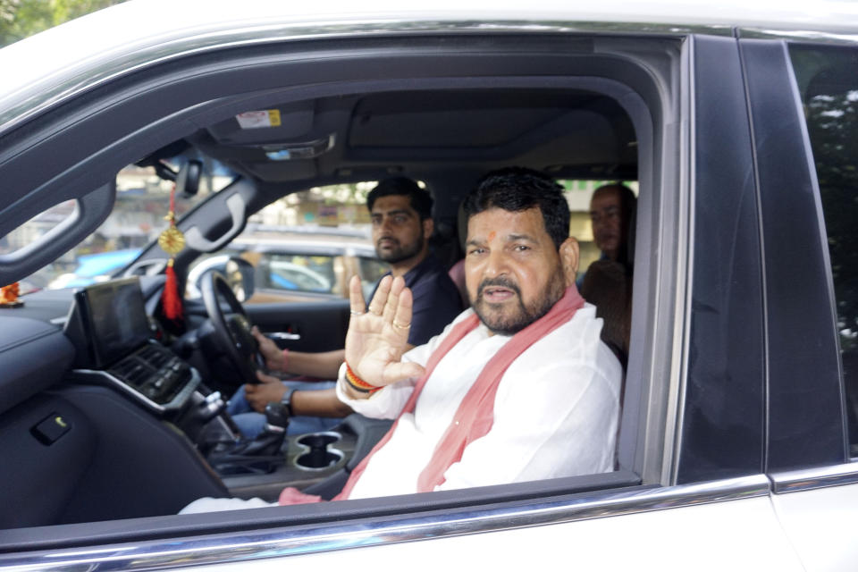 FILE- Wrestling Federation of India President Brij Bhushan Sharan Singh leaves his house after a visit by the Special Investigation Team (SIT) at his residence in New Delhi, India, June 9, 2023. New Delhi police filed charges Thursday of sexual harassment and outraging the modesty of six female athletes by Indian wrestling federation president Brij Bhushan Sharan Singh at the end of their investigation.If convicted, Singh faces a maximum of five years in prison. He denies the allegations. (AP Photo, File)