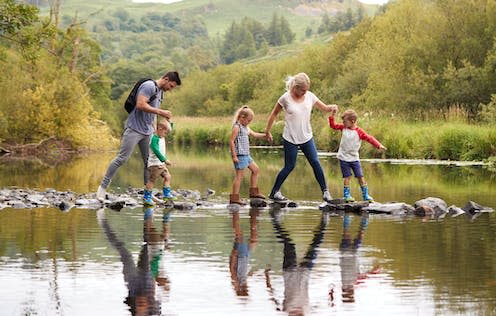   <span class="attribution"><a class="link " href="https://www.shutterstock.com/image-photo/family-crossing-river-whilst-hiking-uk-1188687490" rel="nofollow noopener" target="_blank" data-ylk="slk:Monkey Business Images/Shutterstock;elm:context_link;itc:0;sec:content-canvas">Monkey Business Images/Shutterstock</a></span>