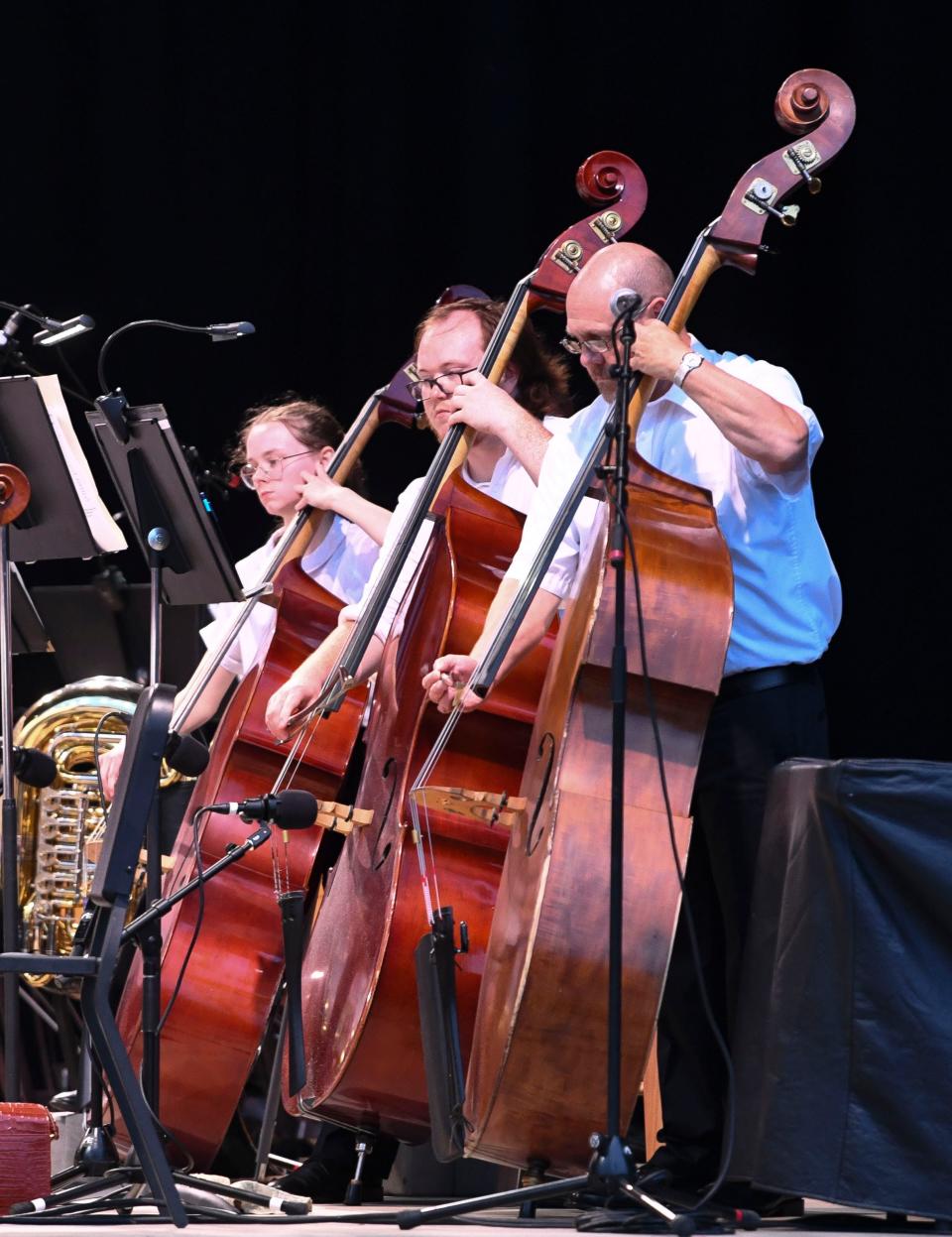 Musicians in the Tuscaloosa Symphony Orchestra play on stage Tuesday, July 4, 2023 during the annual Celebration on the River.