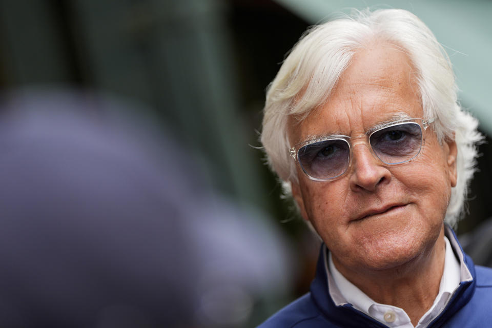 Trainer Bob Baffert speaks with reporters ahead of the 149th running of the Preakness Stakes horse race at Pimlico Race Course, Friday, May 17, 2024, in Baltimore. (AP Photo/Julia Nikhinson)