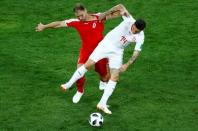 Soccer Football - World Cup - Group E - Serbia vs Switzerland - Kaliningrad Stadium, Kaliningrad, Russia - June 22, 2018 Switzerland's Steven Zuber in action with Serbia's Branislav Ivanovic REUTERS/Fabrizio Bensch