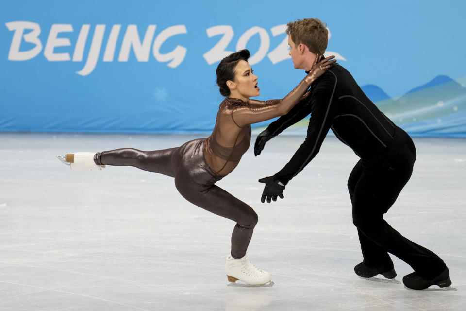 Figure skating couple Madison Chock and Evan Bates, of the USA, practice their dance routine during a training session at the 2022 Winter Olympics, Thursday, Feb. 3, 2022, in Beijing. At the Beijing Winter Games, opening Friday, it’s a homecoming of sorts for one of the world’s most sprawling diasporas — often sweet and sometimes complicated, but always a reflection of where they are, where they come from and the Olympic spirit itself. “Every time I’m on the bus, I’m just looking out and studying the city and just imagining my roots are here, my ancestors are here," says Chock, whose father is Chinese-Hawaiian, with family ties to rural China. (AP Photo/Natacha Pisarenko)