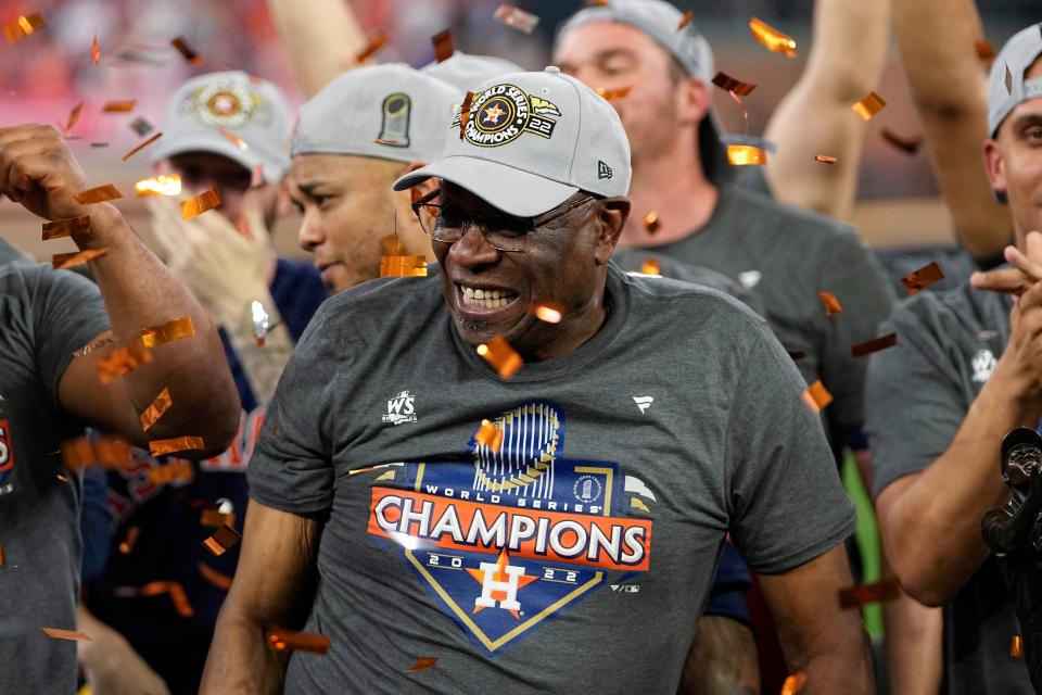 Manager Dusty Baker and the Astros celebrate their World Series title.