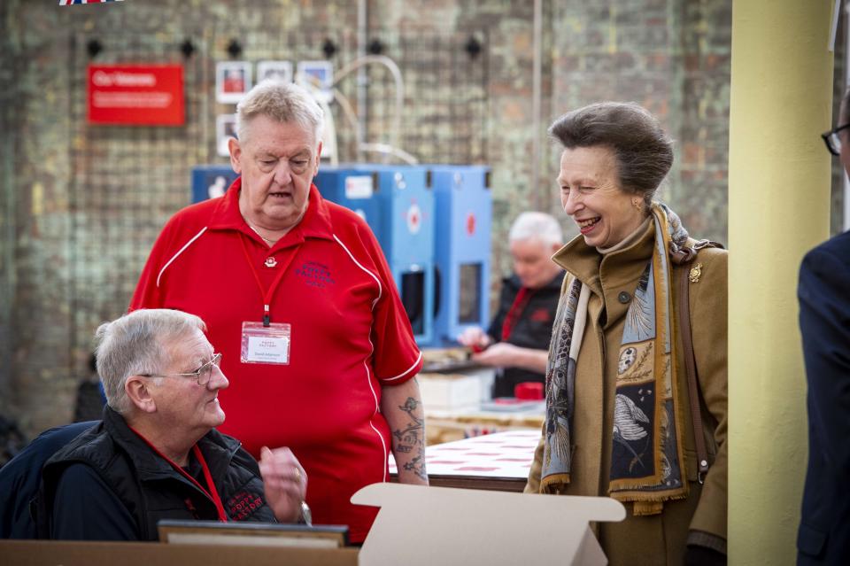 Factory staff Willie Urban, seated, and David Adamson meet the Princess Royal (Mark Owens/Poppy Scotland/PA)