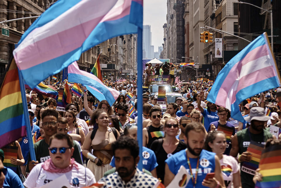 In this June 24, 2018 file photo, revelers take to the streets during the New York City Pride Parade in New York. New York City will host two parades on Sunday, June 30, 2019, in celebration of the 50th anniversary of the Stonewall uprising. The smaller of the two, Queer Liberation March, starts at 9:30 a.m. and the larger Pride march steps off at noon. (AP Photo/Andres Kudacki, File)