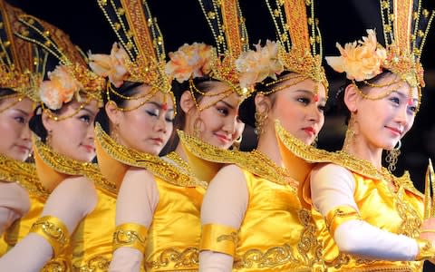 Dancers from the Central Ethnic Song and Dance Ensemble perform during a Chinese New Year celebration in Trafalgar Square, London - Credit: Fiona Hanson/PA Wire