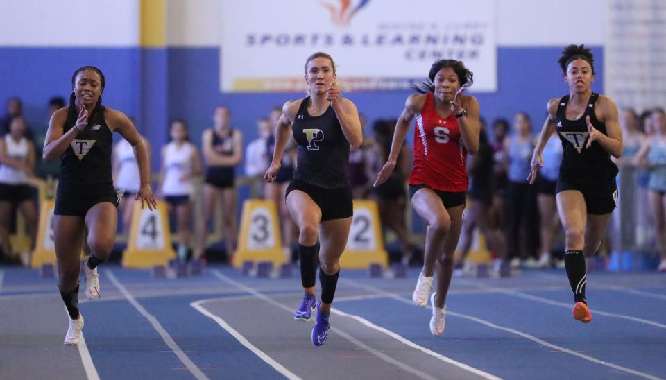 Padua's Juliana Balon (second from left) wins the 55 meter dash during the DIAA indoor track and field championships at the Prince George's Sports and Learning Complex in Landover, Md., Saturday, Feb. 3, 2023. Kiara Davis of Tatnall (left) takes second and Smyrna's Aaliyah Turpin runs to a third place while Arianna Montgomery (right) finished fourth.