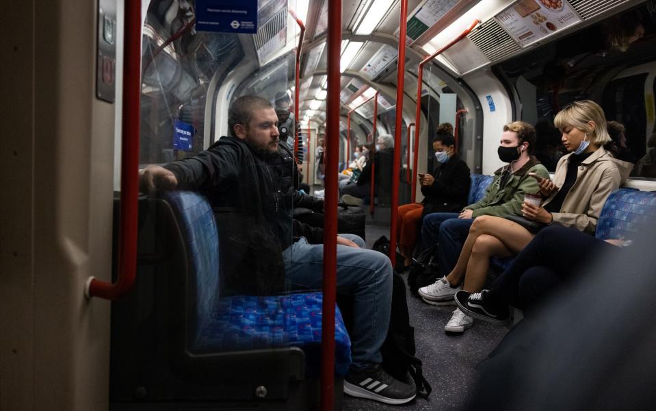 Commuters travel on the underground network during rush hour on July 06, 2021 in London, England. The UK government will no longer compel mask-wearing in enclosed spaces after Covid-19 rules end in England on July 19, but it has left the door open for individual transport providers to require them.  - Getty Images