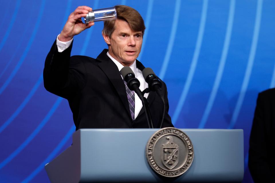 National Nuclear Security Administration Deputy Administrator for Defense Programs Dr. Marvin Adams holds up a cylinder he says is similar to one used by the Lawrence Livermore National Laboratories (Getty Images)